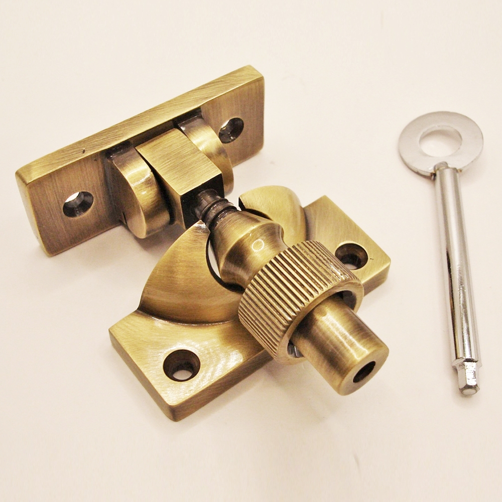 TWC001L/AB • Locking • Antique Brass • Forged Brighton Sash Fastener